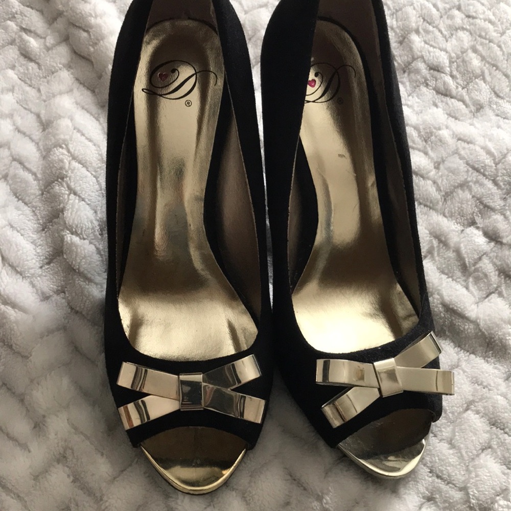 Black and gold heels